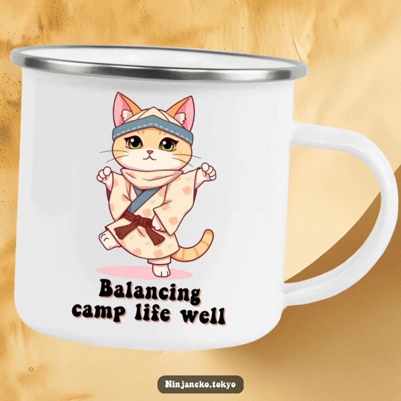 Funny camping mug depicting a ninja cat in a patterned kimono perfectly balancing on one paw, perfect for rugged trips.