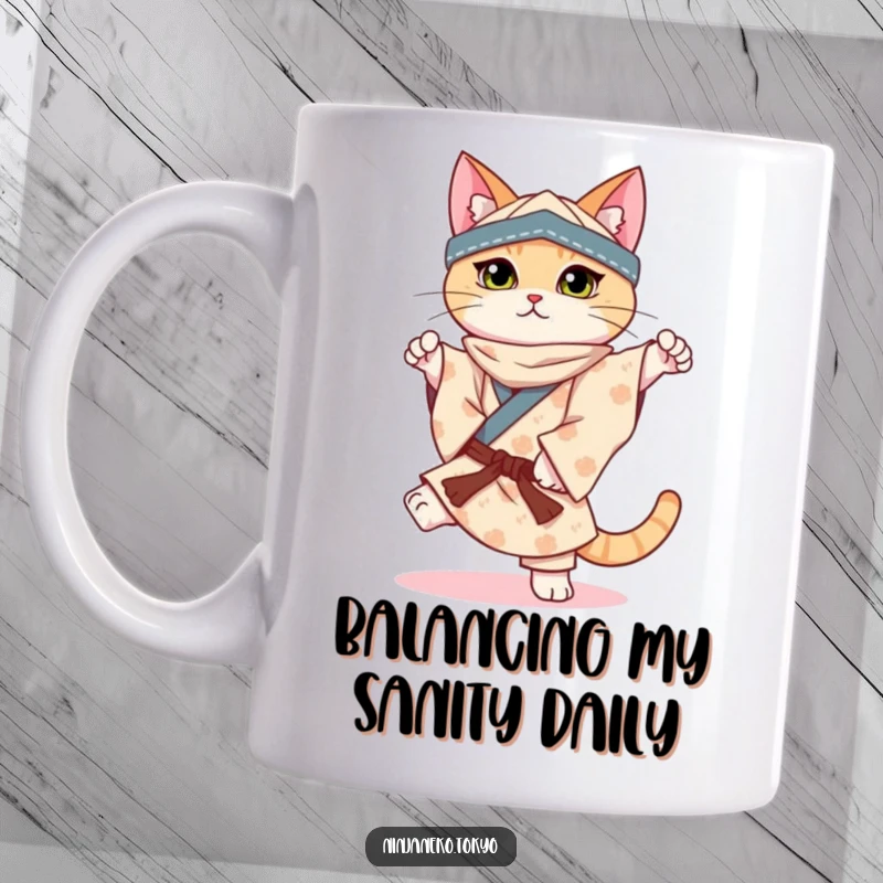 Funny mug featuring a ninja cat in a patterned kimono perfectly balancing on one paw, showcasing incredible poise.