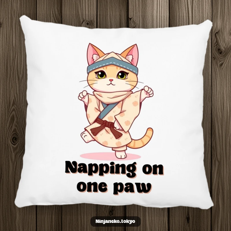 Funny pillow featuring a ninja cat in a patterned kimono perfectly balancing on one paw, providing comfort and charm.