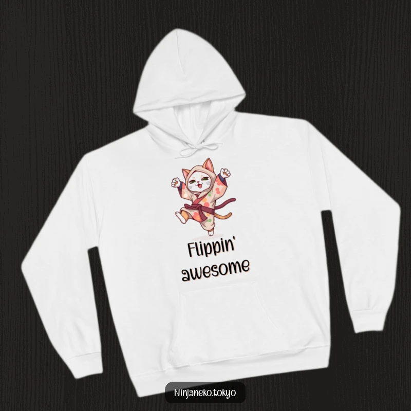 Funny ninja cat in a vibrant kimono performing a playful somersault, designed for comfort and laughs on this cozy hoodie.