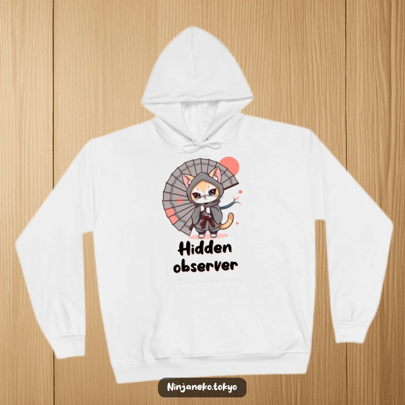 Funny Hoodie: A ninja cat in a kimono playfully hides behind a giant Japanese fan, exuding secret humor and feline charm.