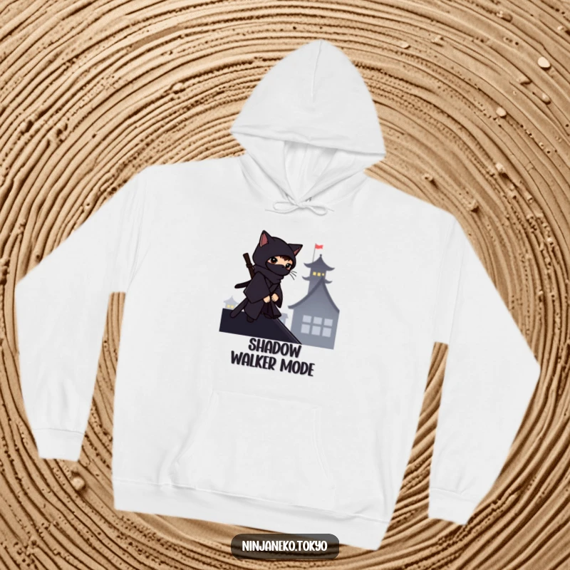 Funny ninja cat in a dark kimono on a rooftop silhouette, on a cozy hoodie, blending mystery with humor.