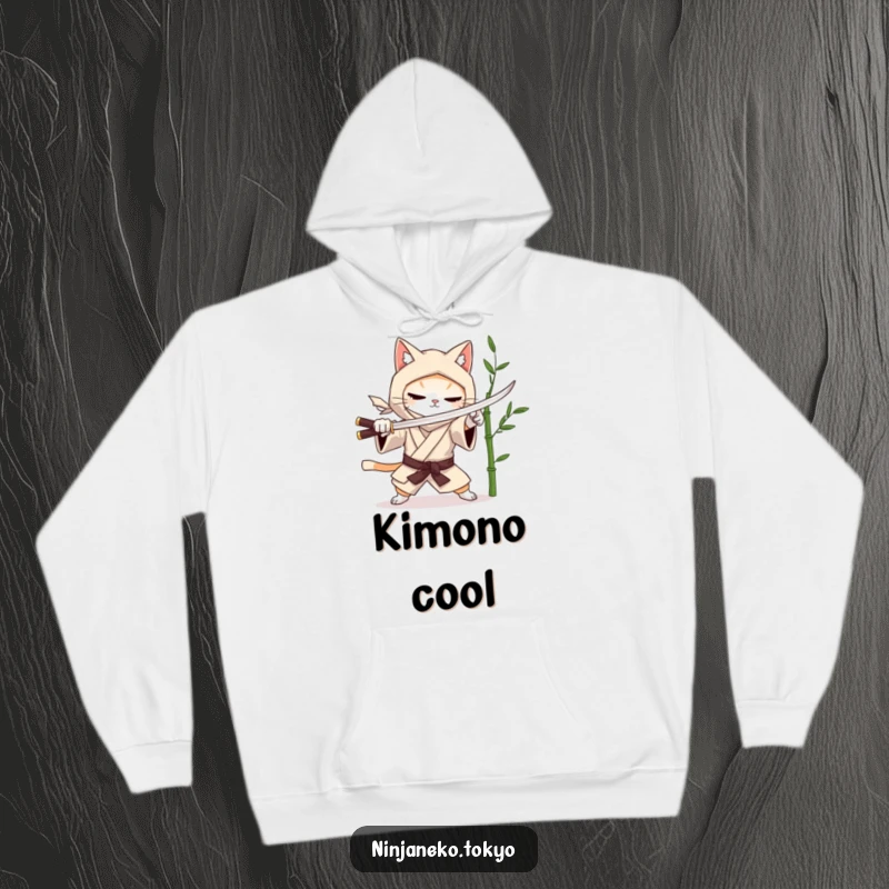 Funny hoodie featuring a ninja cat in a kimono practicing mock sword fighting with a bamboo stalk. Warm and humorous apparel. Great funny gift.