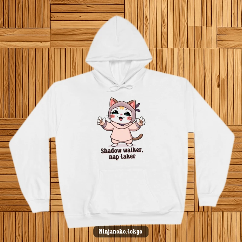 Funny hoodie with a happy ninja cat celebrating success, paws in the air, embodying a playful and stealthy vibe.