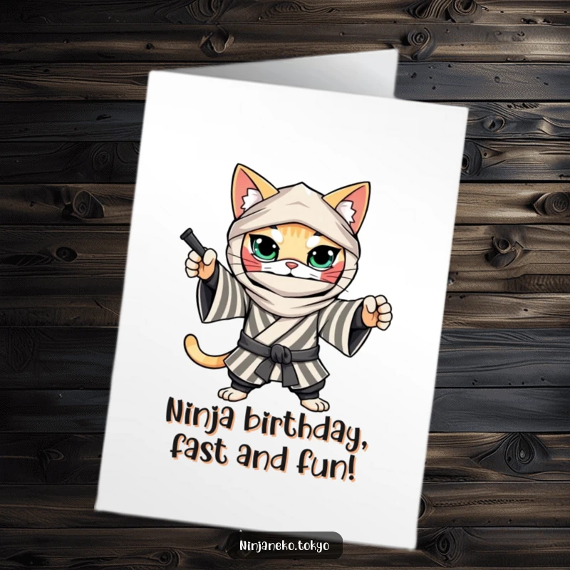 Funny Free Printable Birthday Card: A determined ninja cat in a striped kimono striking a dynamic ninja pose.