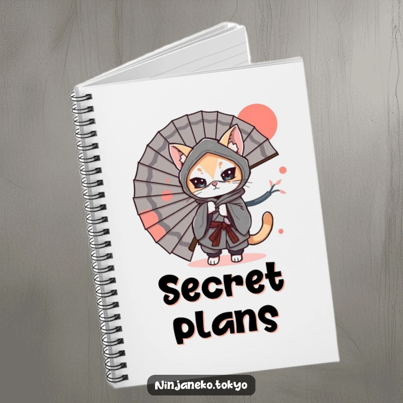 Funny Notebook: A ninja cat in a kimono hides behind a fan, symbolizing secret thoughts and humorous plans.