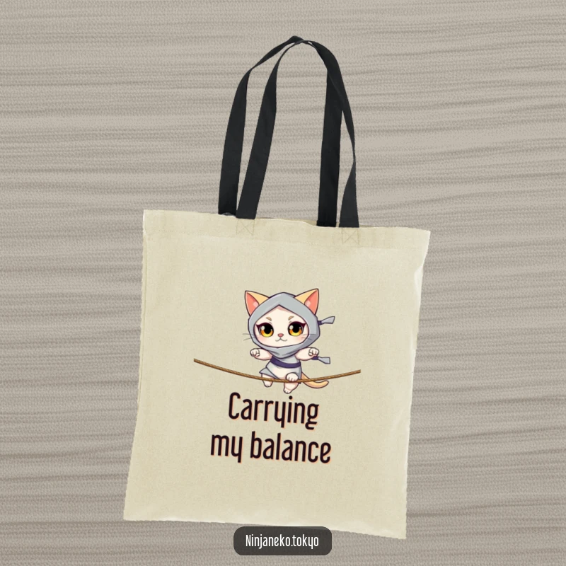 Funny tote bag featuring a ninja cat with alert eyes balancing on a thin rope, showcasing agility and humor. Excellent funny gift.