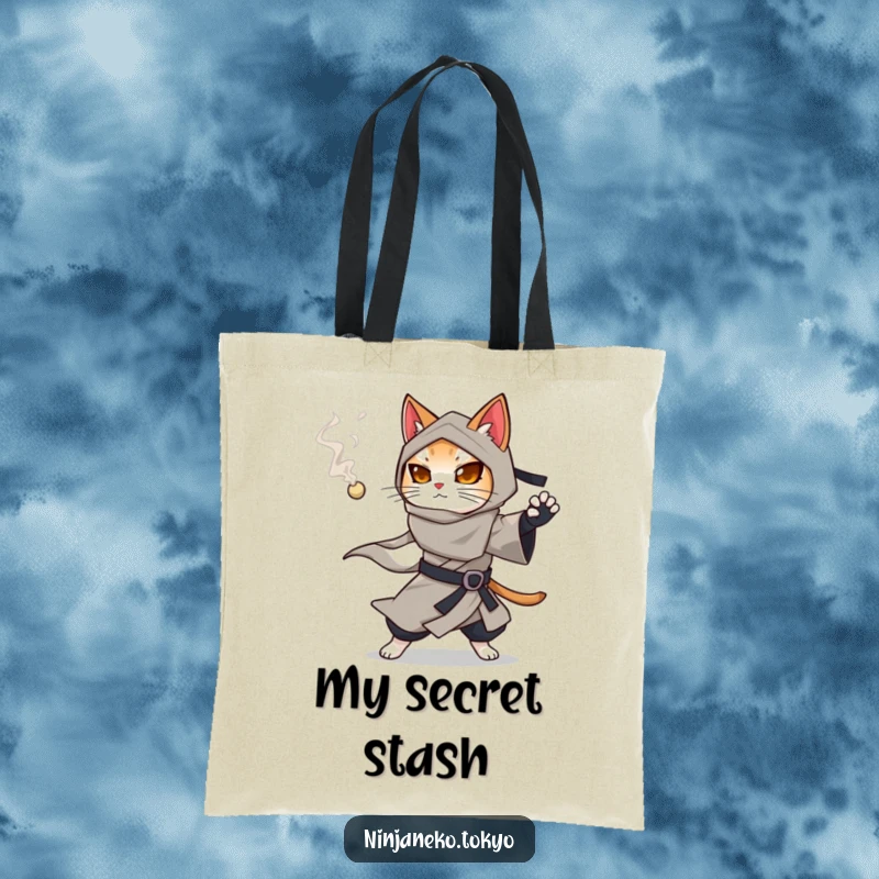 Funny ninja cat in a flowing kimono holding a smoking pellet, a humorous and practical tote bag design.